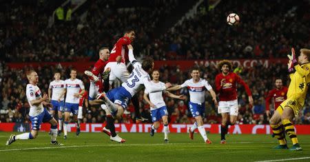 Britain Football Soccer - Manchester United v Wigan Athletic - FA Cup Fourth Round - Old Trafford - 29/1/17 Manchester United's Chris Smalling scores their second goal Action Images via Reuters / Jason Cairnduff Livepic EDITORIAL USE ONLY. No use with unauthorized audio, video, data, fixture lists, club/league logos or "live" services. Online in-match use limited to 45 images, no video emulation. No use in betting, games or single club/league/player publications. Please contact your account representative for further details.