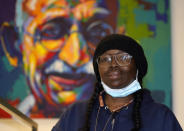 Sheneen McClain, the mother of Elijah McClain, a young man who died after a stop by police in Aurora, Colo., and has spurred investigations of police practices while galvanizing calls for police reforms, is shown in the office of her attorney, Qusair Mohamedbhai, Wednesday, March 3, 2021, in Denver. (AP Photo/David Zalubowski)