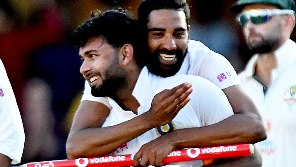 India erupted in celebration after defeating Australia 2-1 in their four Test series on Tuesday. (Photo by Bradley Kanaris/Getty Images)