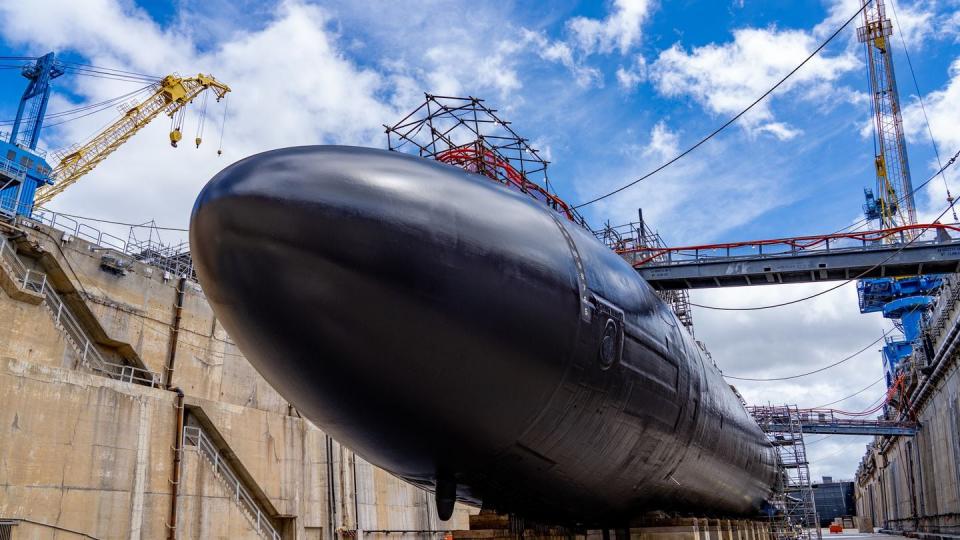 The Los Angeles-class fast-attack submarine Topeka undocks on schedule at the Pearl Harbor Naval Shipyard and Intermediate Maintenance Facility. (Dave Amodo/U.S. Navy)