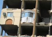 A general view of a partialy destructed building at Al-Haram area, in Giza