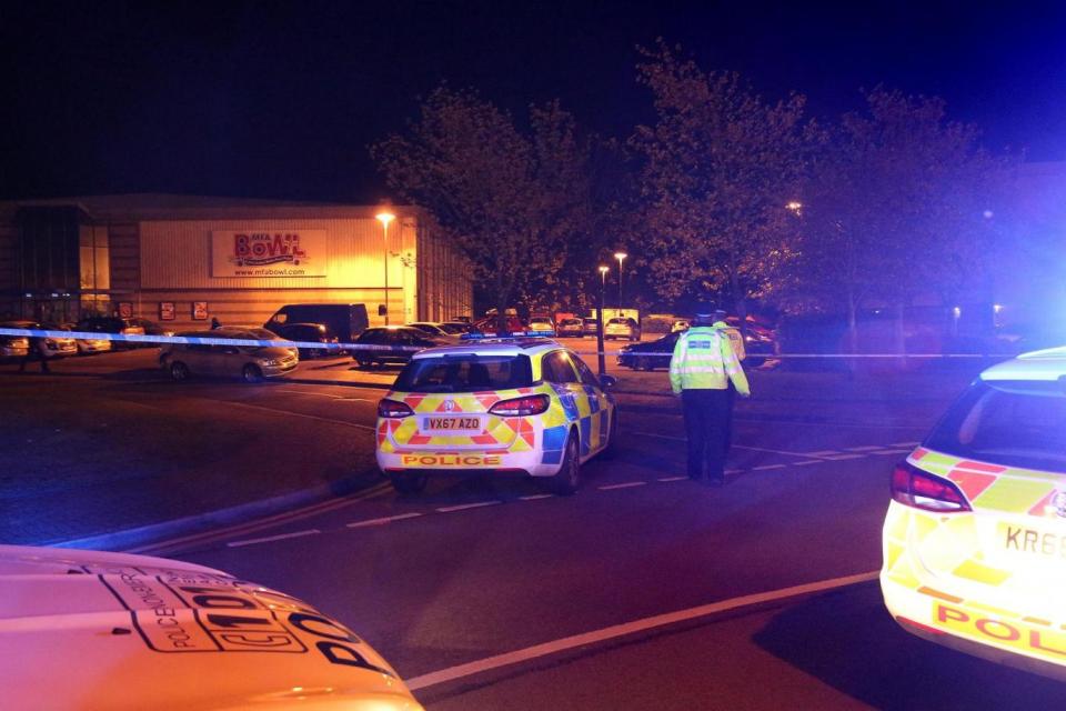 Police at the scene at Bermuda Park (PA)