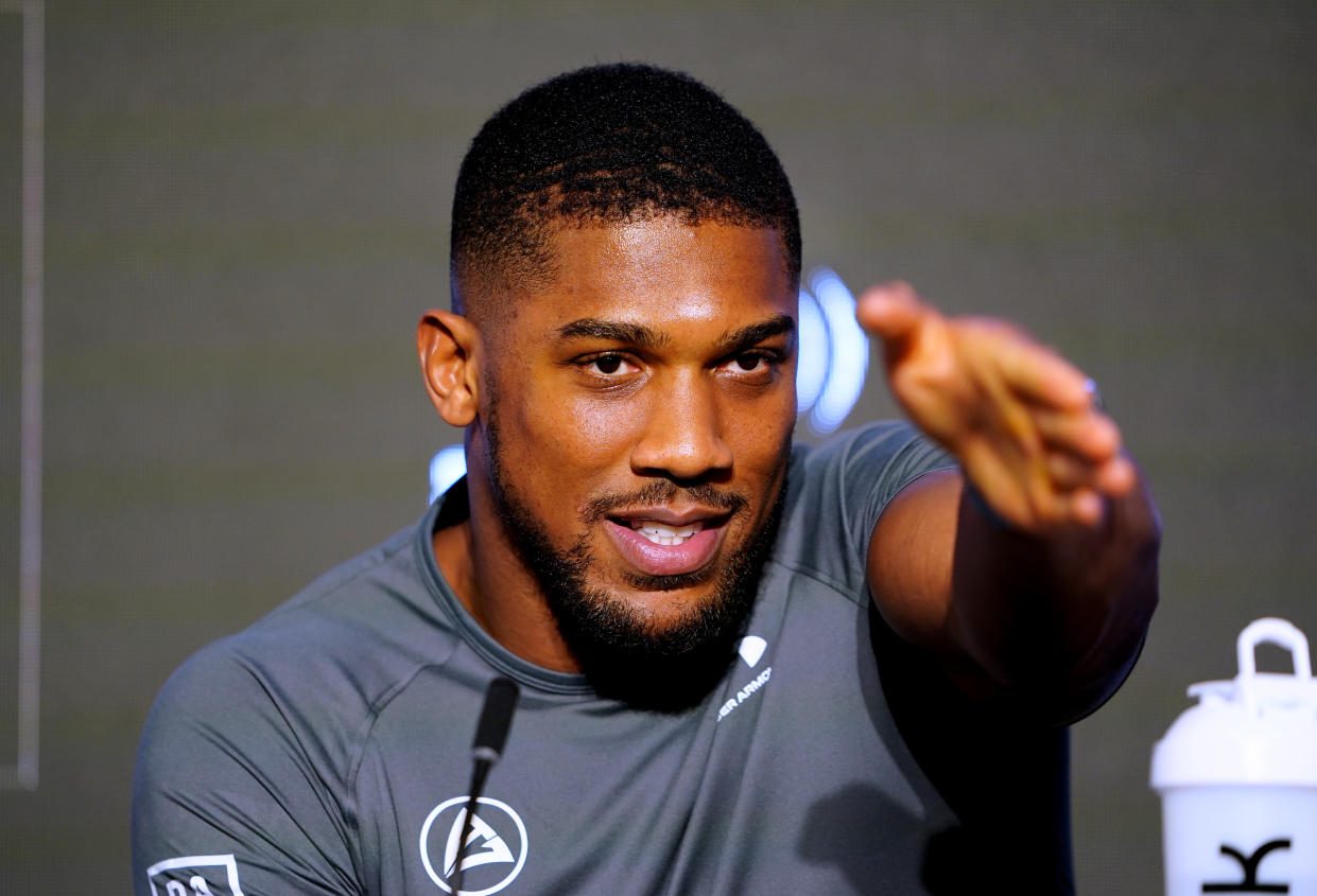 Anthony Joshua gestures during a news conference at Nobu Hotel London Portman Square, in London, prior to his fight Saturday at the O2 Arena against Jermaine Franklin. (Photo by Zac Goodwin/Getty Images)