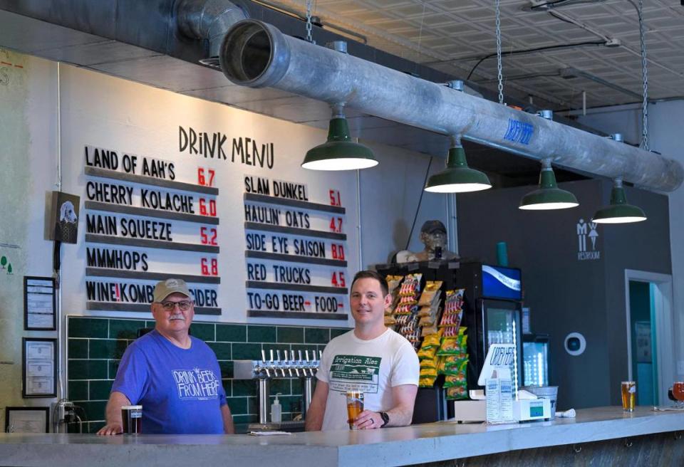 Bill Mahin Jr., left, was a 30-year employee of the Kansas Bostwick Irrigation District, in and around the Kansas towns of Courtland and Scandia. He is now a co-brewer at Irrigation Ales, the brewery his son, Luke, opened last year in downtown Courtland.