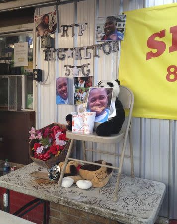 An impromptu memorial has been set up after Alton Sterling, 37, was shot and killed during an altercation with two Baton Rouge police officers in Baton Rouge, Louisiana, U.S. on July 5, 2016. REUTERS/Bryn Stole