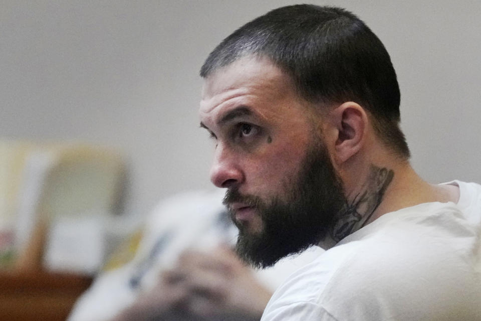 Adam Montgomery listens during his sentencing hearing at Hillsborough Superior Court, Thursday, May 9, 2024, in Manchester N.H. Montgomery was found guilty of second-degree murder earlier in the year in the death of his 5-year-old daughter, Harmony, who police believe was killed nearly two years before she was reported missing in 2021 and whose body was never found. (AP Photo/Charles Krupa, Pool)