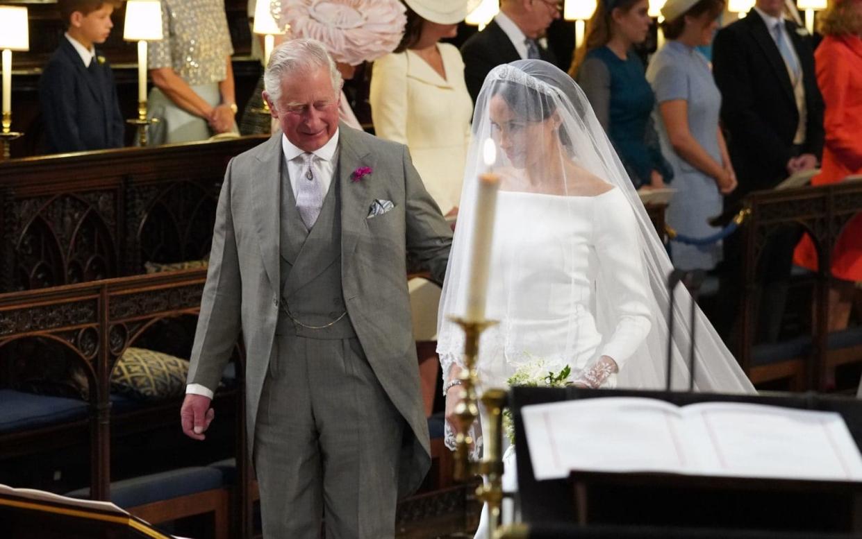 Prince Charles accompanies Meghan down the aisle at her Windsor wedding to Prince Harry - PA