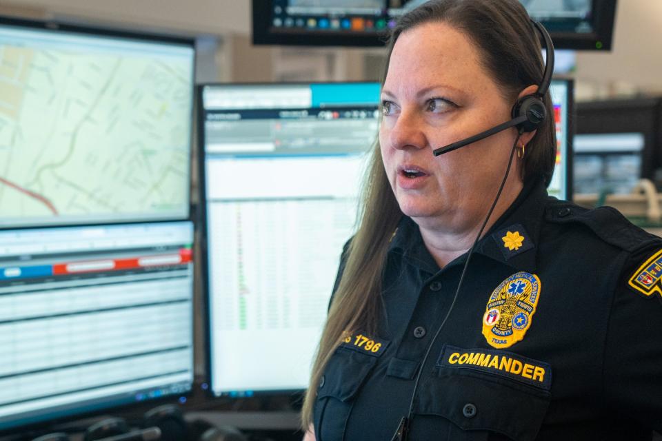 Angela Vorhies, Communications Commander with Austin Travis-County EMS, takes a call at the Combined Transportation, Emergency and Communications Center (CTECC) Thursday, June 20, 2024.