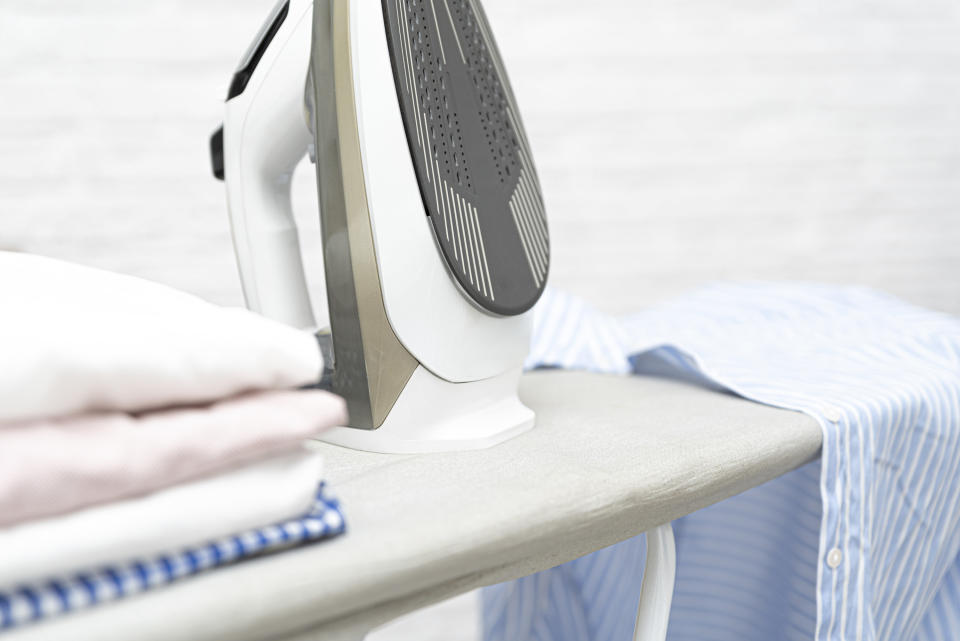 An ironing board on top of an iron