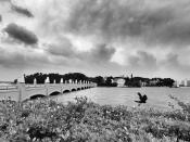 <p>Rapidly rising water at the bridge leading to Star Island Saturday in Miami. (Photo: Holly Bailey/Yahoo News) </p>