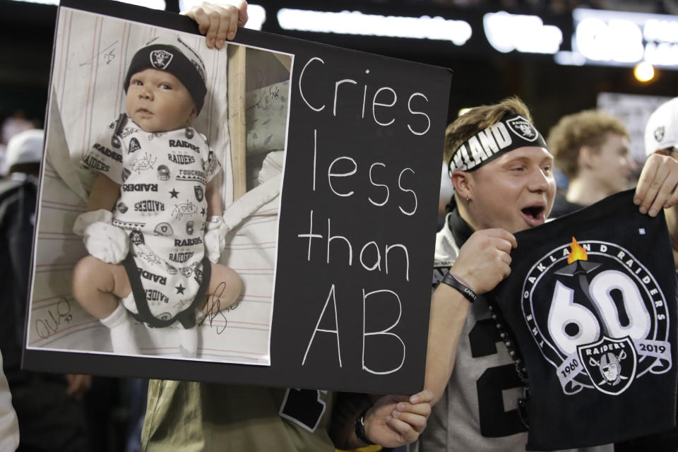 An Oakland Raiders cheers during the first half of an NFL football game against the Denver Broncos Monday, Sept. 9, 2019, in Oakland, Calif. (AP Photo/Ben Margot)