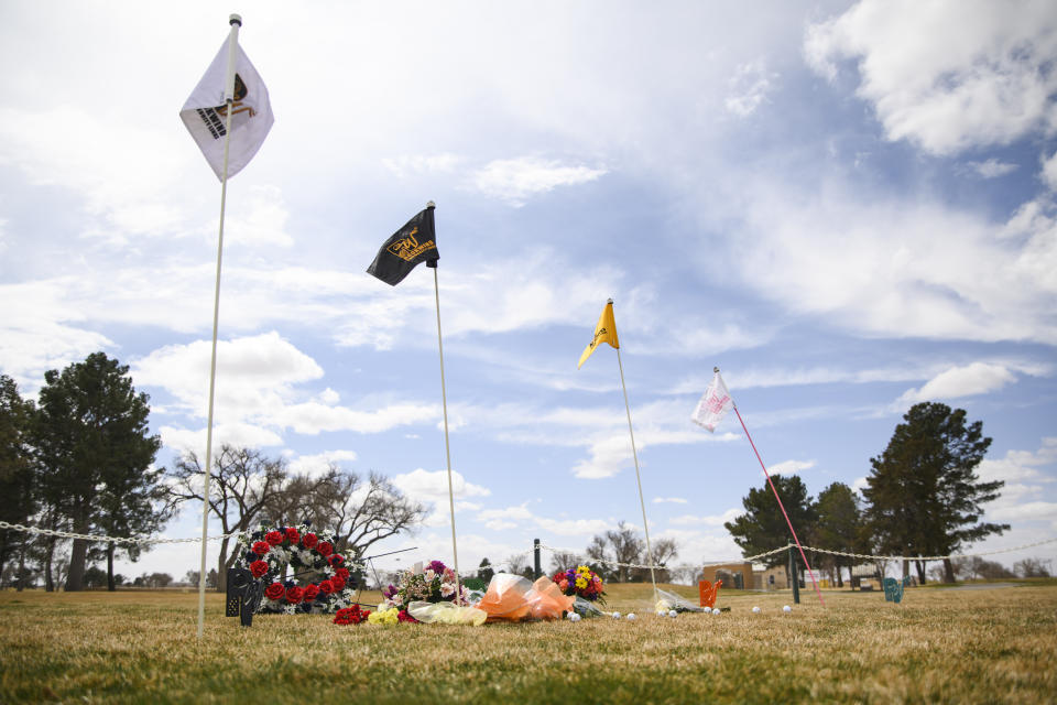 A memorial erected in honor of the University of the Southwest golf teams car wreck is seen Thursday, March 17, 2022 at the Rockwind Community Links in Hobbs, N.M. Late Tuesday, the University of the Southwest men's and women's golf teams were involved in a fatal car crash half a mile north of State Highway 115 on Farm-to-Market Road 1788 in Andrews County while on the way back from tournament play in Midland. Nine people were killed in the wreck including six students, one coach, and two in a pickup that collided head-on with the university's van. (Eli Hartman/Odessa American via AP)