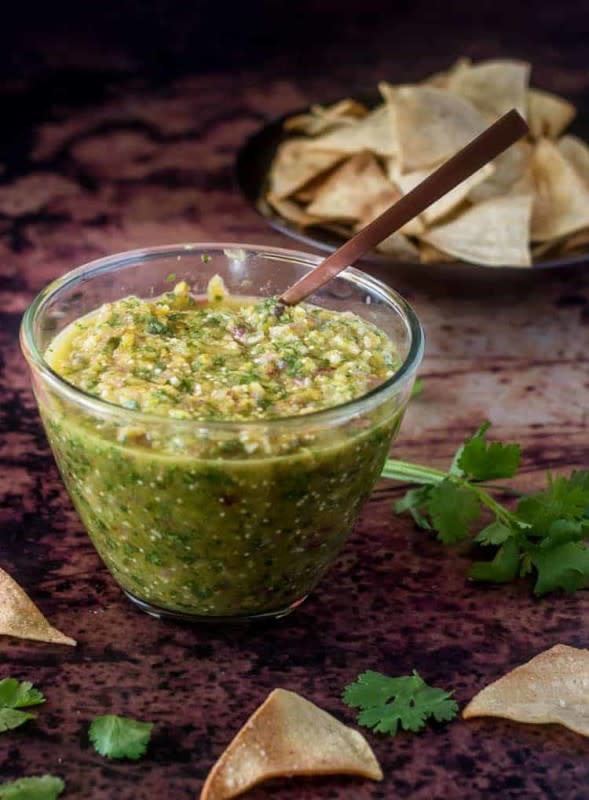 <p>Beyond Mere Sustenance</p><p>This salsa is great with chips, on your favorite taco or as a finishing sauce on Mexican spice-rubbed and grilled pork chops!</p><p><strong>Get the recipe: <a href="https://beyondmeresustenance.com/roasted-tomatillo-hatch-green-chile-salsa/" rel="nofollow noopener" target="_blank" data-ylk="slk:Roasted Tomatillos Hatch Green Chile Salsa;elm:context_link;itc:0;sec:content-canvas" class="link ">Roasted Tomatillos Hatch Green Chile Salsa</a></strong></p>