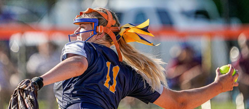 Mooresville's Josi Hair (11) pitches during a game between the Mooresville Pioneers and the Whiteland Lady Warriors on Tuesday, May 17, 2022, at Whiteland High School in Whiteland Ind. 