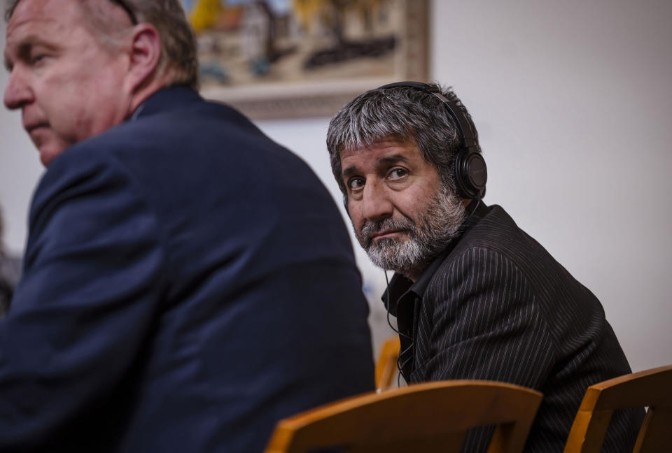 Muhammad Syed sits next to his defense attorney Thomas Clark, left, during closing arguments at the Bernalillo County Courthouse in Downtown Albuquerque, N.M,, on Friday, March 15, 2024. Prosecutors on Friday wrapped up their case against Syed on charges that he gunned down a man in 2022 in what turned out to be the first of three ambush-style killings involving members of the Muslim community in New Mexico's largest city. (Chancey Bush/The Albuquerque Journal via AP, Pool)