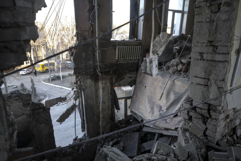 A damaged part of the hospital of Donetsk Clinical Territorial Medical Association is seen after what Russian officials in Donetsk said it was a shelling by Ukrainian forces, in Donetsk, in Russian-controlled Donetsk region, Ukraine, Tuesday, Dec. 20, 2022. (AP Photo/str)