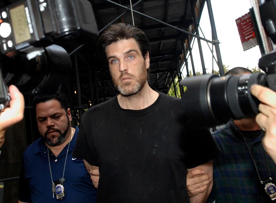 Robert Chambers is led in handcuffs into Manhattan criminal court for his arraignment, Oct. 23, 2007, in New York. Chambers, was released Tuesday, July 25, 2023, after spending 15 years in prison for drug and assault charges, according to state records.