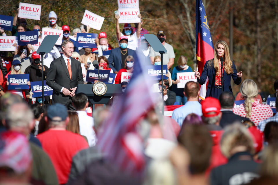 Sen. Kelly Loeffler (R-GA) speaks to supporters at the Stop the Steal the Defend the Majority Rally alongside Sen. David Perdue (R-GA) on Friday, Nov. 20, 2020 in Canton, GA. (Jason Armond / Los Angeles Times via Getty Images)