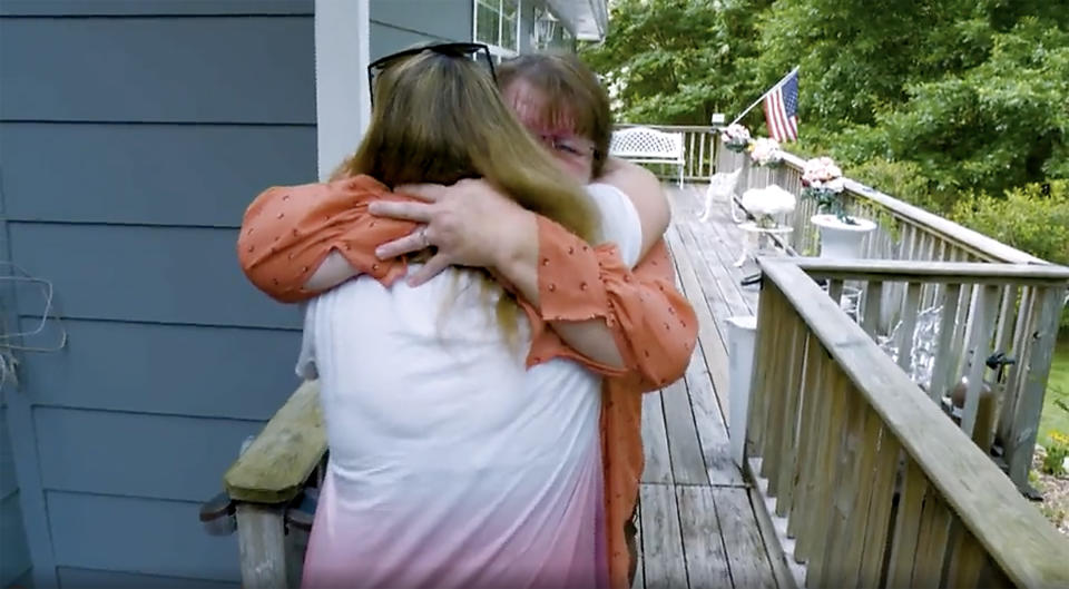 Nancy Womac (in orange) shared a hug with daughter Melanie Spencer this summer that was 42 years in the making. (TODAY)