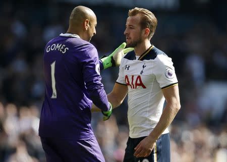 Britain Football Soccer - Tottenham Hotspur v Watford - Premier League - White Hart Lane - 8/4/17 Watford's Heurelho Gomes and Tottenham's Harry Kane embrace at the end of the game Action Images via Reuters / Paul Childs Livepic