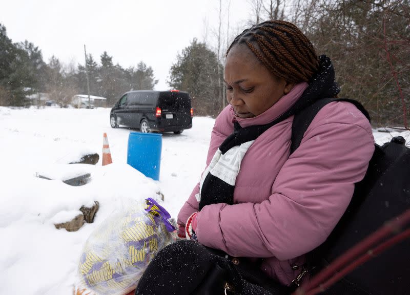 FILE PHOTO: Asylum seekers cross into Canada from Roxham Road in Champlain New York