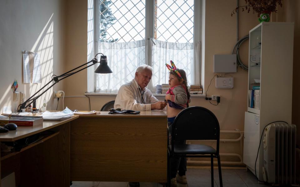 Doctor Yuri Sokolov with a young patient - Andrey Borodulin 