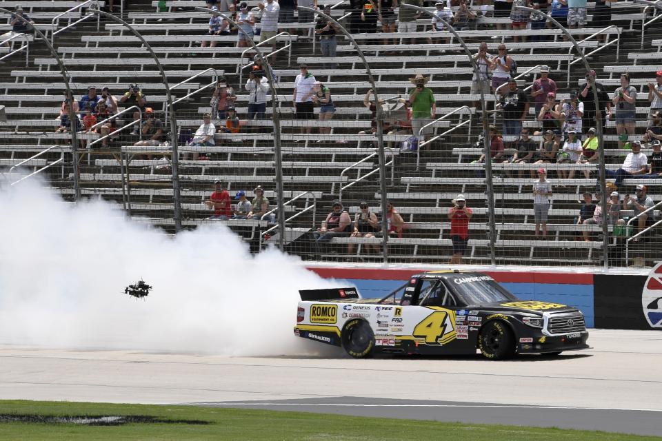 John Hunter Nemechek spins out on the front stretch after winning a NASCAR Truck Series auto race at Texas Motor Speedway in Fort Worth, Texas, Saturday, June 12, 2021. (AP Photo/Larry Papke)