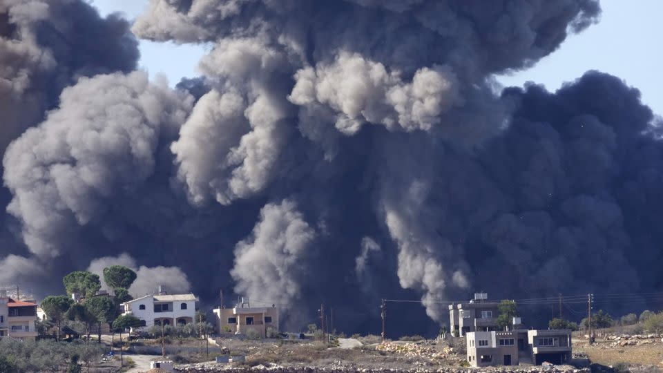 Black smoke rises from an Israeli airstrike on the outskirts of Aita al-Shaab, a Lebanese border village with Israel in southern Lebanon, on November 4. - Hussein Malla/AP