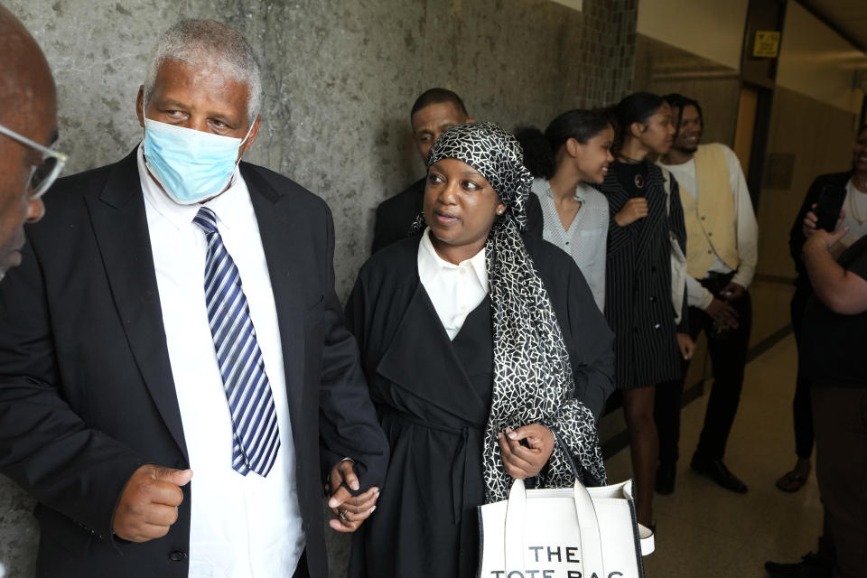 Edward Franklin, a son of music superstar Aretha Franklin and wife Tonja leave court, Tuesday, July 11, 2023, in Pontiac, Mich. A document handwritten by singer Aretha Franklin and found in her couch after her 2018 death is a valid Michigan will, a jury said Tuesday, a critical turn in a dispute that has turned her sons against each other. (AP Photo/Carlos Osorio)