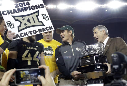 Commissioner Bob Bowlsby (R) is not popular in Big 12 country right now. (AP)