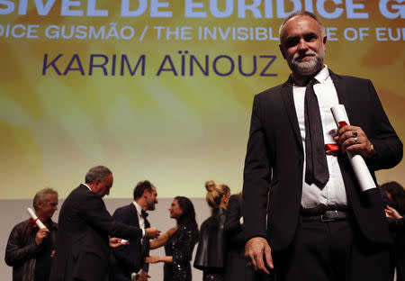 72nd Cannes Film Festival - Un Certain Regard prize - Cannes, France, May 24, 2019. Director Karim Ainouz poses after winning the Grand Prix Un Certain Regard Award for the film "The Invisible Life of Euridice Gusmao" (A Vida Invisivel de Euridice Gusmao). REUTERS/Eric Gaillard