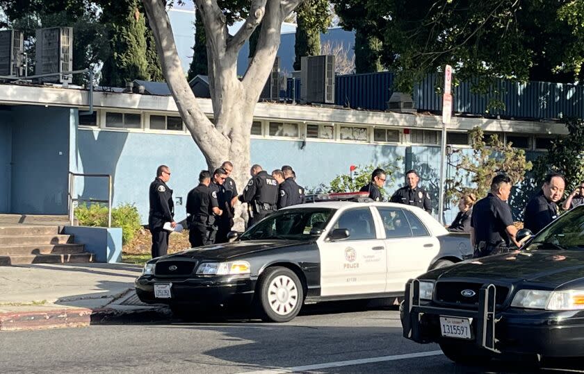 There were more than two dozen officers gathered as part of the investigation and control of the crime scene. This is along Rimpau just south of Olympic.