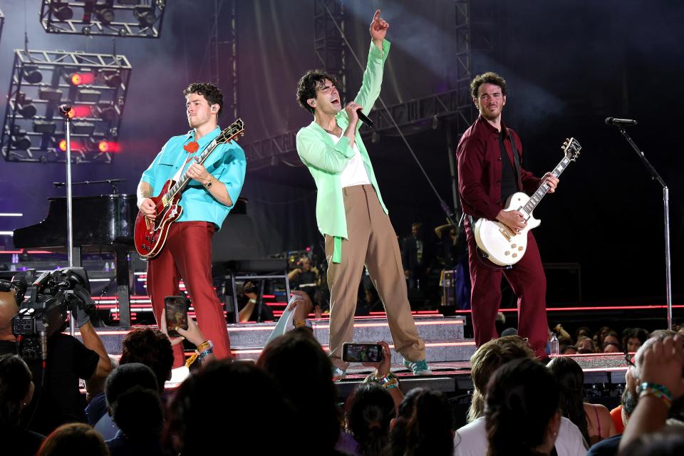 The Jonas Brothers perform on stage during The Tour opening night at Yankee Stadium on Aug. 12, 2023, in New York City.