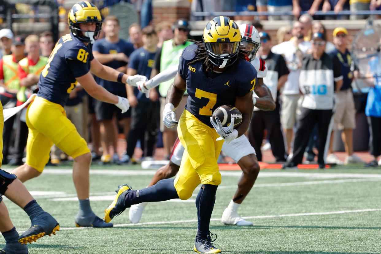 Michigan Wolverines running back Donovan Edwards runs for a touchdown first half against the Arkansas State Red Wolves at Michigan Stadium in Ann Arbor on Saturday, Sept. 14, 2024.