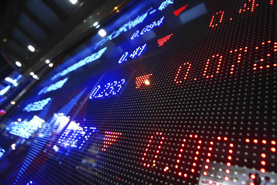 A digital display showing stock market moves.