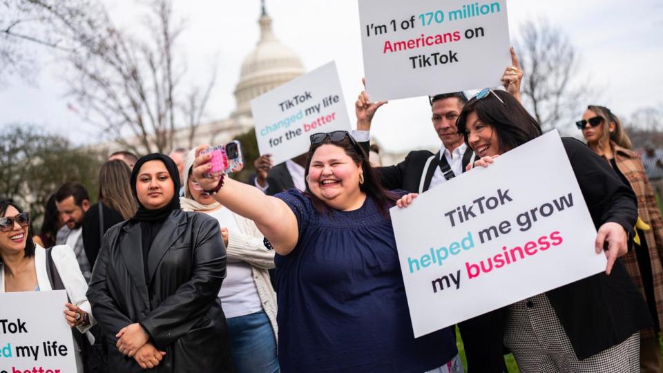 PHOTO: Tik Tok supporters are seen outside the U.S. Capitol, March 13, 2024, in Washington.       (Tom Williams/CQ-Roll Call, Inc via Getty Images)