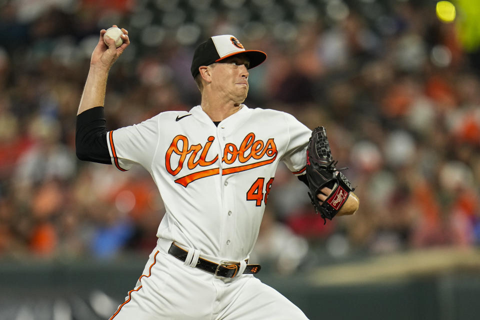 Baltimore Orioles starting pitcher Kyle Gibson throws to the Toronto Blue Jays during the first inning of a baseball game, Thursday, Aug. 24, 2023, in Baltimore. (AP Photo/Julio Cortez)