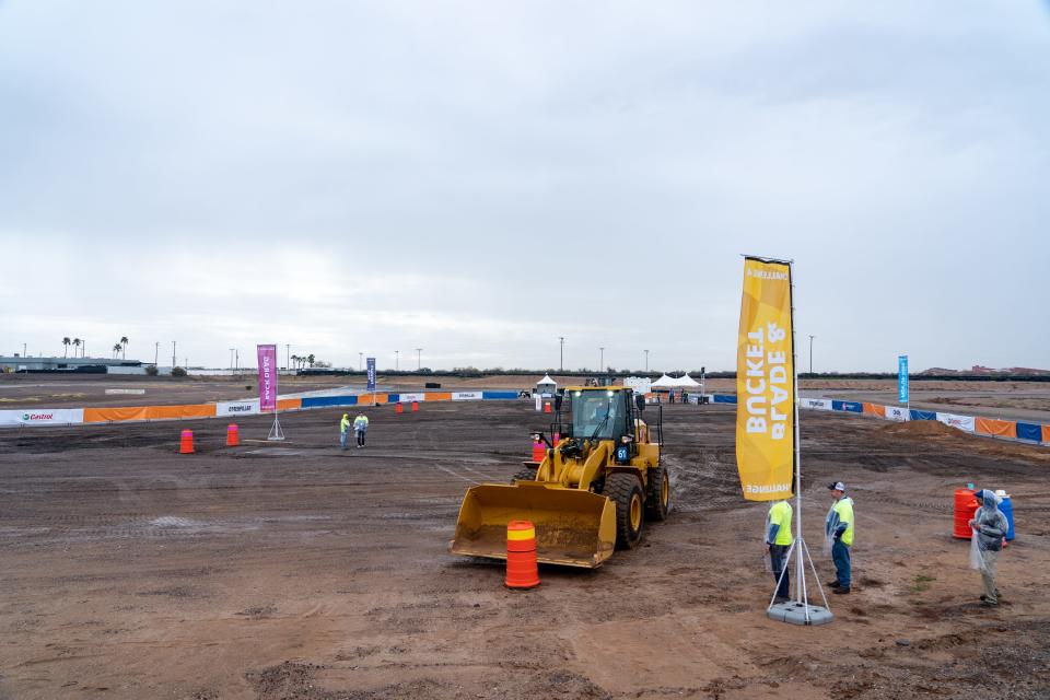 Edwin Rivera of Denver drives a wheel loader during Republic Services' 2023 ROAD-EO Championship at the Wild Horse Pass Motorsports Park in Chandler on Feb. 21, 2023.