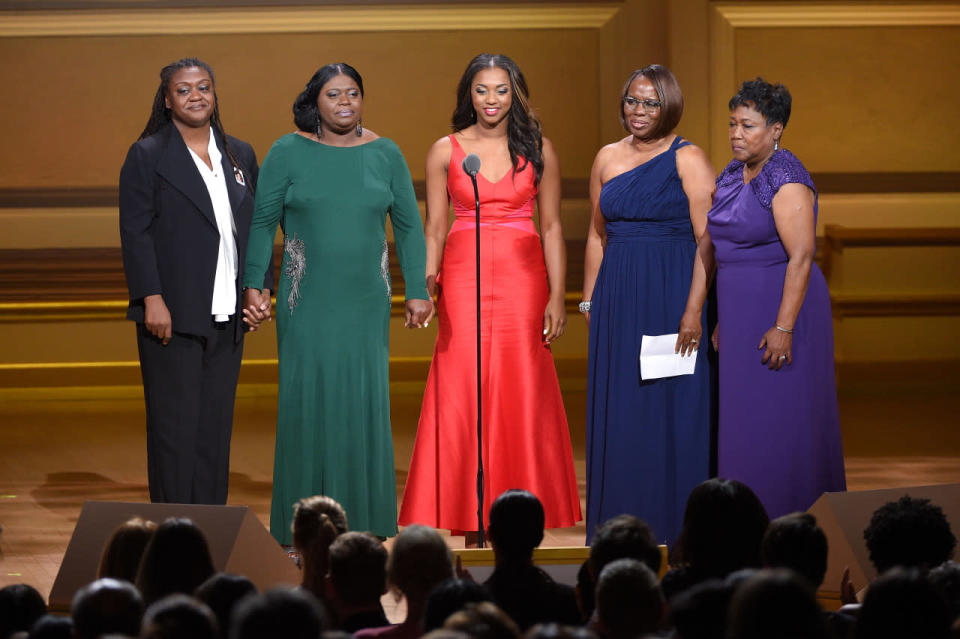 The women of Charleston, dubbed “The Peacemakers,” accepting their award at the 2015 Glamour Women Of The Year Awards.