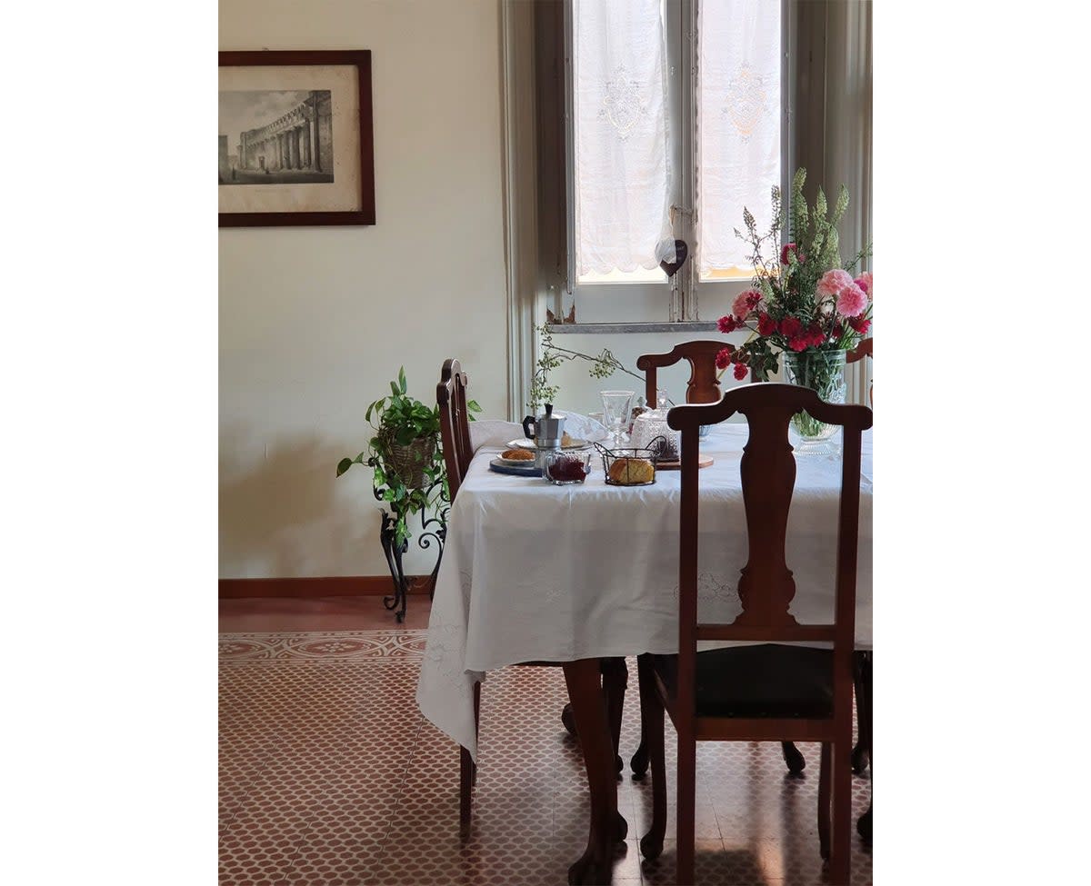 Original tile floors, cheery textiles and bold floral wallpapers rub along comfortably at this B&B (L'Olivella)