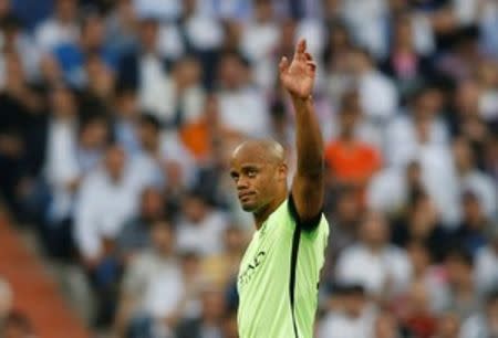 Football Soccer - Real Madrid v Manchester City - UEFA Champions League Semi Final Second Leg - Estadio Santiago Bernabeu, Madrid, Spain - 4/5/16 Manchester City's Vincent Kompany waves to fans as he walks off to be substituted after sustaining an injury Action Images via Reuters / Carl Recine Livepic