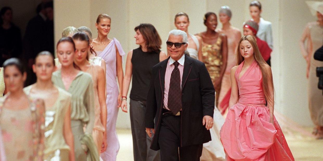 german designer karl lagerfeld c appears on the catwalk after the 1999 springsummer haute couture show of the chanel fashion house in paris 19 january photo by pierre verdy afp photo credit should read pierre verdyafp via getty images