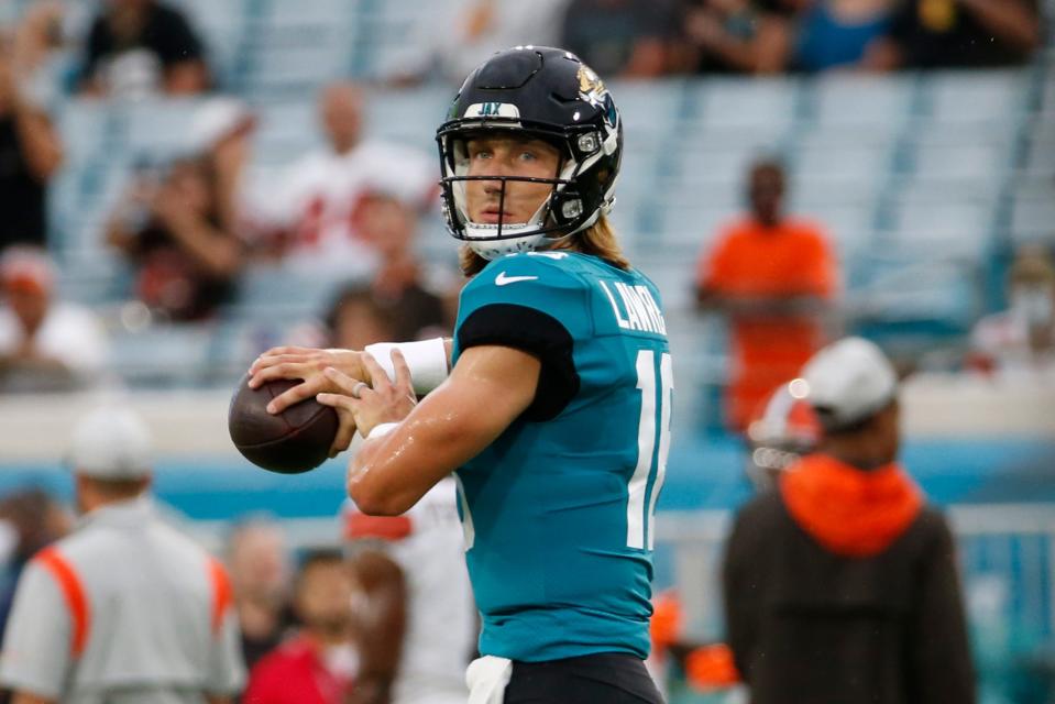 Jacksonville Jaguars quarterback Trevor Lawrence warms up before a preseason game against the Browns on Aug. 14, 2021, in Jacksonville, Fla.