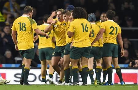 Rugby Union - Argentina v Australia - IRB Rugby World Cup 2015 Semi Final - Twickenham Stadium, London, England - 25/10/15 Australia players celebrate Adam Ashley-Cooper scoring a try Reuters / Dylan Martinez Livepic