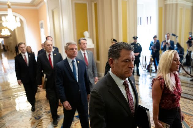 U.S. Reps. Marjorie Taylor Greene (R-GA), and Mark Green (R-TN) and other impeachment managers carry the articles of impeachment against Homeland Security Secretary Alejandro Mayorkas into the Senate Chamber on Capitol Hill on April 16, 2024 in Washington, DC. (Photo by Andrew Harnik/Getty Images)