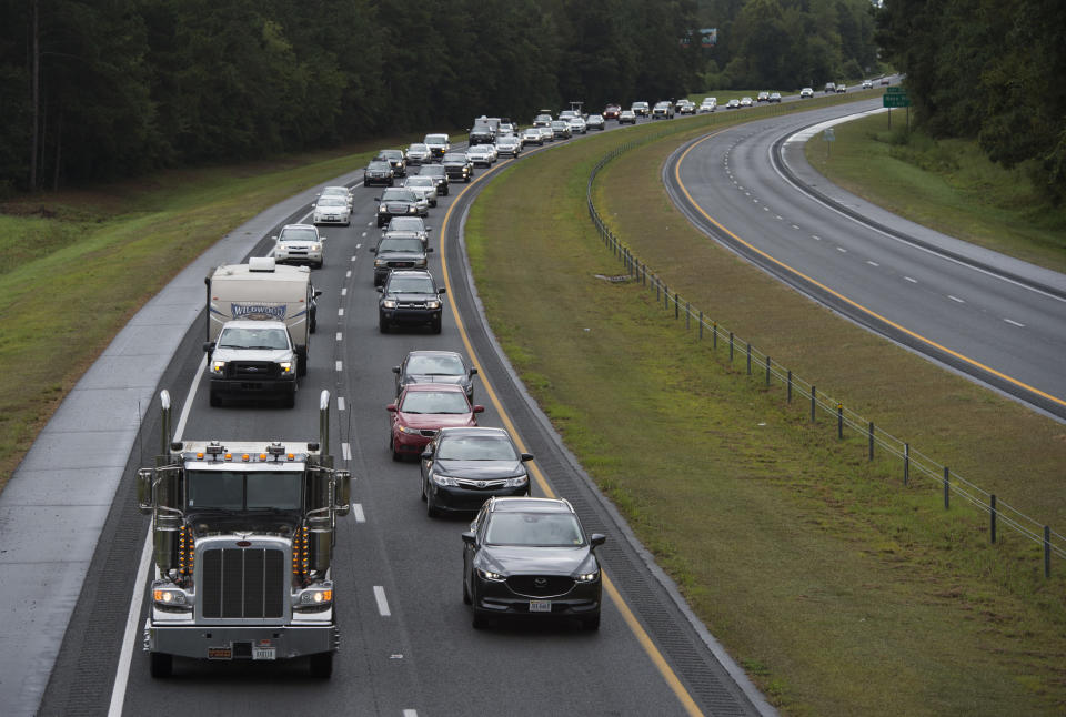 Residents evacuate from coastal areas near Wallace, North Carolina, on Tuesday.&nbsp;