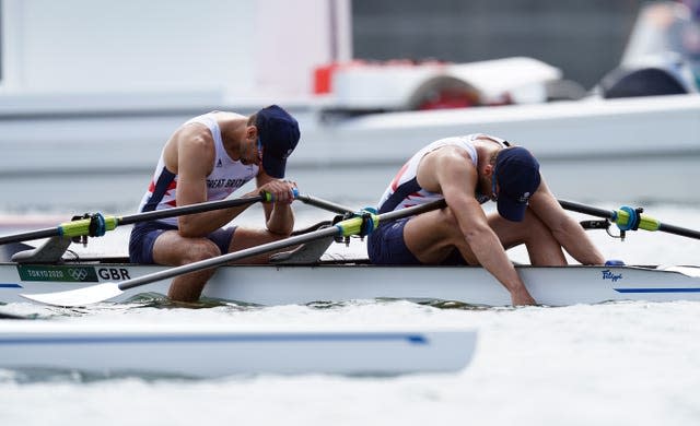 Graeme Thomas and John Collins react to finishing fourth