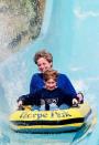 <p>Princess Diana and Prince Harry can't resist the thrill of a water ride at Thorpe Park in Chertsey. </p>