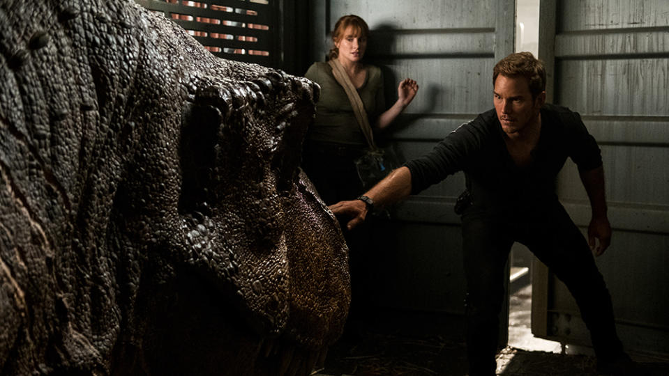 Claire (BRYCE DALLAS HOWARD) and Owen (CHRIS PRATT) try not to wake the mighty T. rex in "Jurassic World: Fallen Kingdom." When the island's dormant volcano begins roaring to life, Owen and Claire mount a campaign to rescue the remaining dinosaurs from this extinction-level event. Welcome to "Jurassic World: Fallen Kingdom."