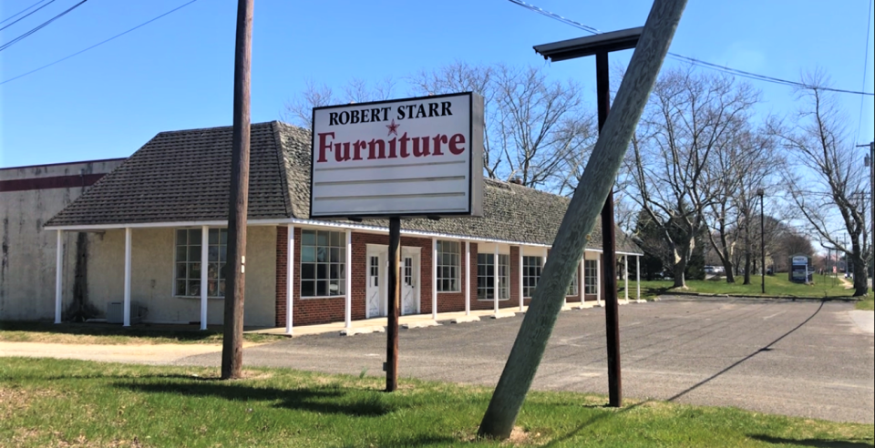 The former Robert Starr Furniture store property at 147 Bridgeton Pike in Mullica Hill, and an adjacent residential property at 149 Bridgeton Pike, are part of a development application submitted to the Harrison Township Joint Land Use Board. A scheduled March 16, 2023 hearing was postponed. A hearing now is set for Oct. 5. PHOTO: March 30, 2023.
(Credit: Joseph P. Smith)